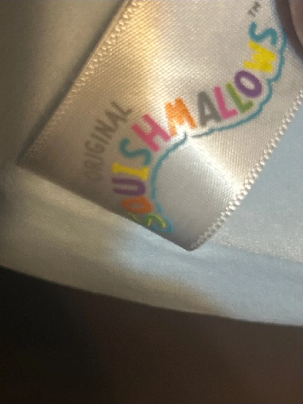 Squishmallows Plush Lyric SquirrPillow with Pink and Teal Pom Poms and Gold Trim